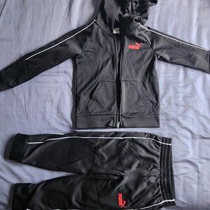 Puma athletic  waterproof black tracksuit with red logo size 5